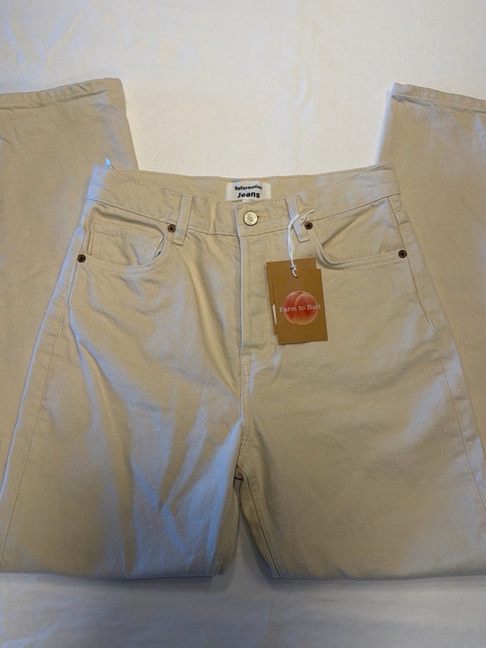 Reformation High-Rise Jeans in Light Tan